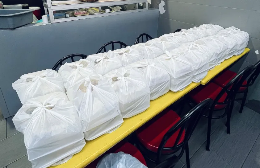 Tempahan nasi ayam dibungkus untuk kenduri